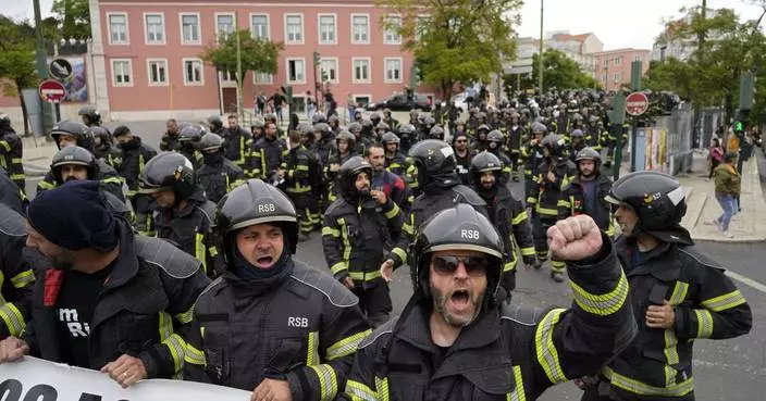 Portuguese firefighters protest outside parliament over labor conditions