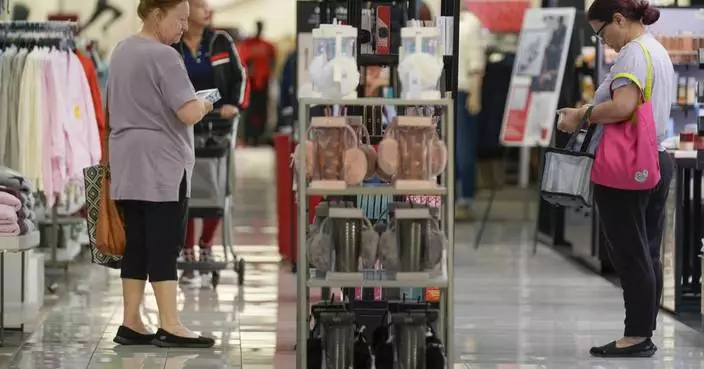 US shoppers spent more at retailers last month in latest sign consumers are driving growth