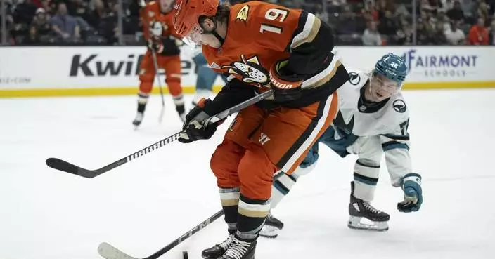 Terry, Carlsson lead Ducks to 3-1 victory over winless Sharks