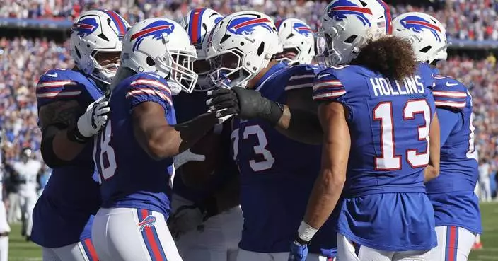 Cooper scores in his Bills debut and Allen shakes off a sluggish start in 34-10 rout of Titans