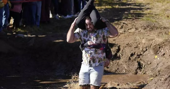 Mud, beer and cash: Annual wife-carrying championship attracts competitive couples to Maine