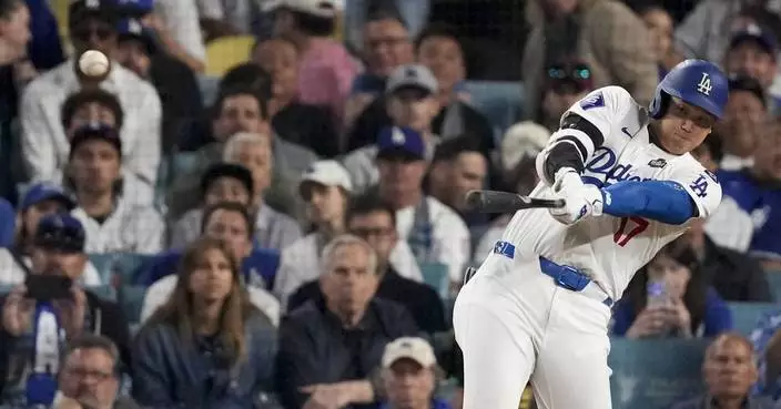 Freeman hits 1st game-ending slam in World Series history as Dodgers top Yankees 6-3 in opener