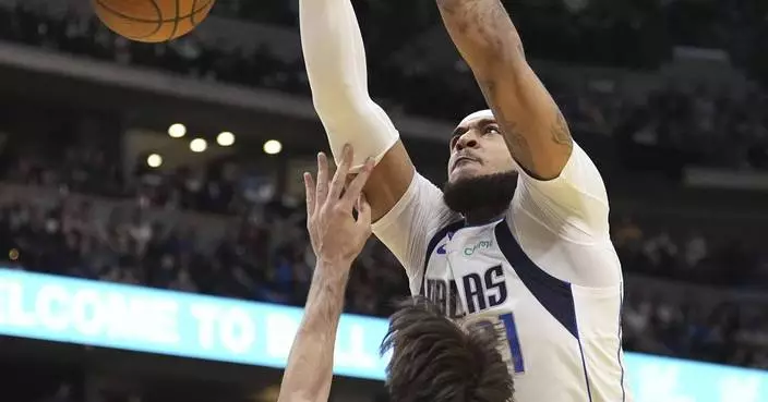 Mavericks recover after losing 24-point lead, overcome Jokic's triple-double to beat Nuggets 123-120