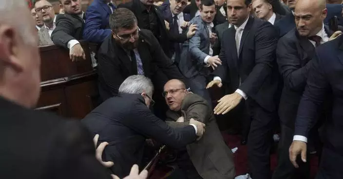 Scuffles in Serbian parliament as deadly station collapse sparks anger at the government