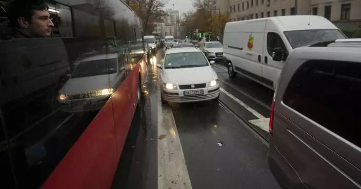 Protesters in Serbian cities block traffic, standing in silence for the victims of roof collapse