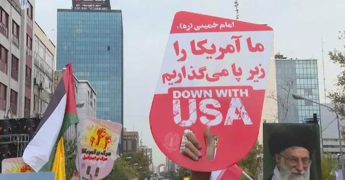 Iranians rally in Tehran, protesting against US hegemony, Israeli violence