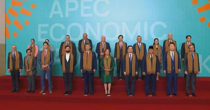 APEC leaders pose for group photo in Lima