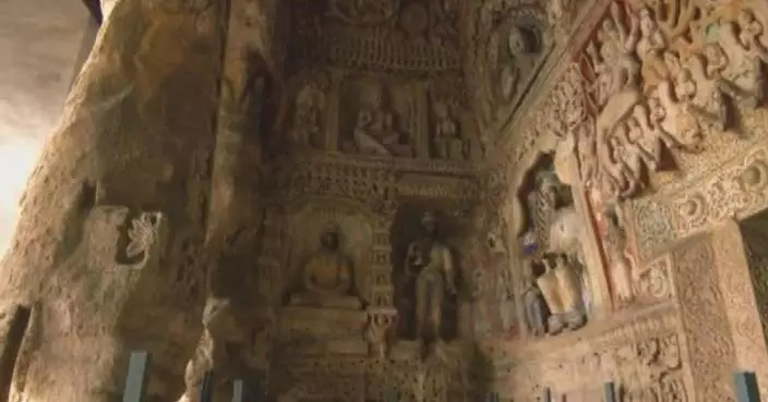 Cave in ancient Buddhist grottoes reopens to public after maintenance work