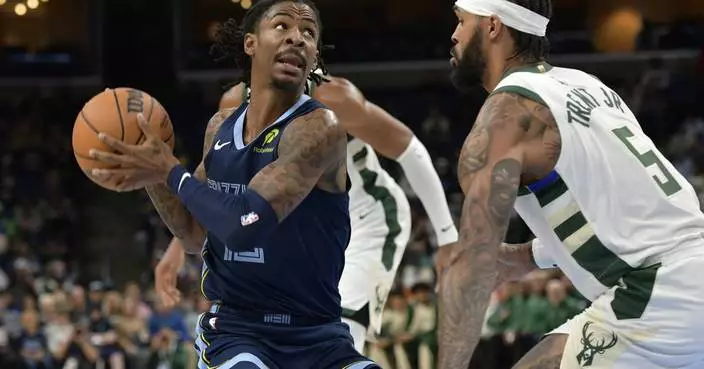 Morant&#8217;s triple-double helps Grizzlies build big lead and coast to 122-99 victory over Bucks