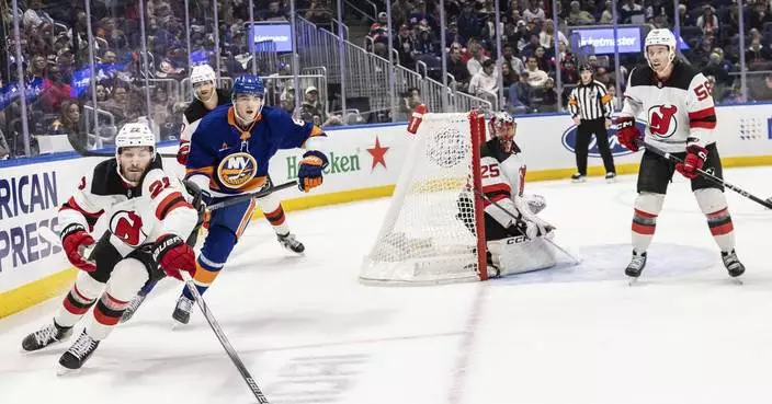 Jack Hughes scores second goal of night in OT as Devils rally to beat Islanders 4-3