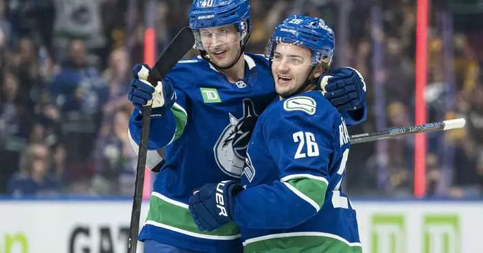 Pettersson and Brannstrom have a goal and assist each and Canucks top Flames 3-1