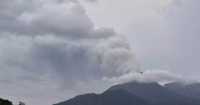 Volcanic eruption burns houses in Indonesia, killing at least 10 people