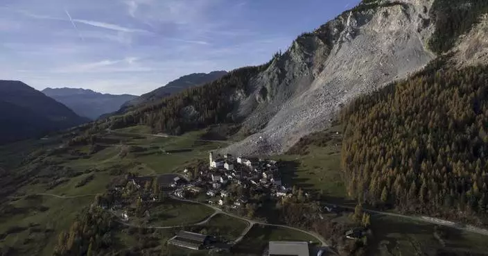 Swiss villagers pack up for evacuation over fears of another rockslide