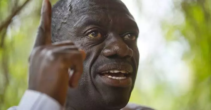 Wife of Ugandan opposition figure Besigye says he was kidnapped and is being held in a military jail