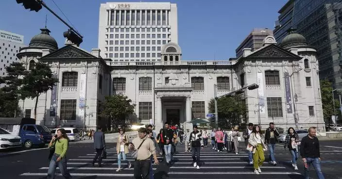 South Korea&#8217;s central bank cuts a key rate to nurse a slower economy