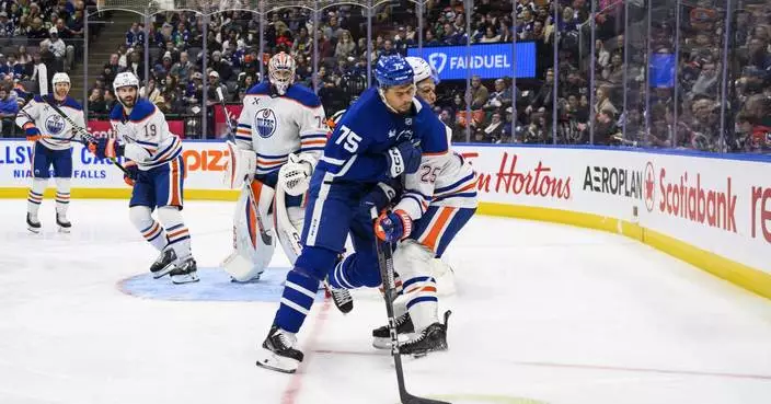 Oilers' Darnell Nurse left bloodied after hit to head from Maple Leafs' Reaves