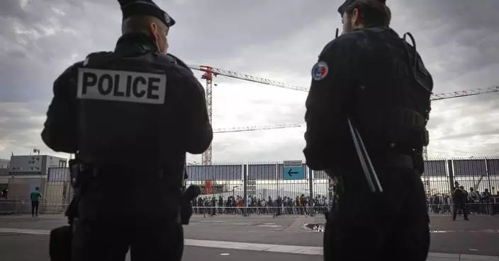 Thousands of police officers but few visiting fans for France-Israel soccer match after attacks