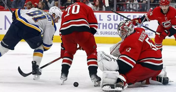 Necas scores twice in 4-point night as Hurricanes beat Blues