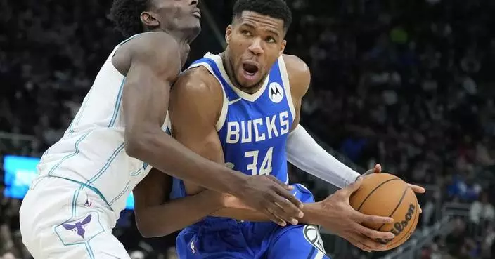 Ball&#8217;s career-high 50 points not enough as Antetokounmpo, Lillard lead Bucks past Hornets 125-119