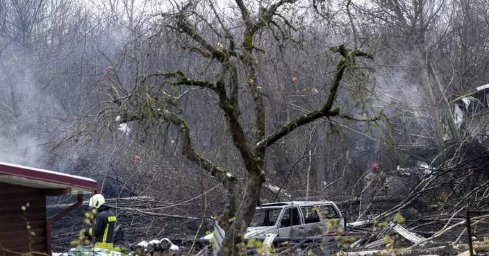 DHL cargo plane crashes into a house in Lithuania, killing at least 1