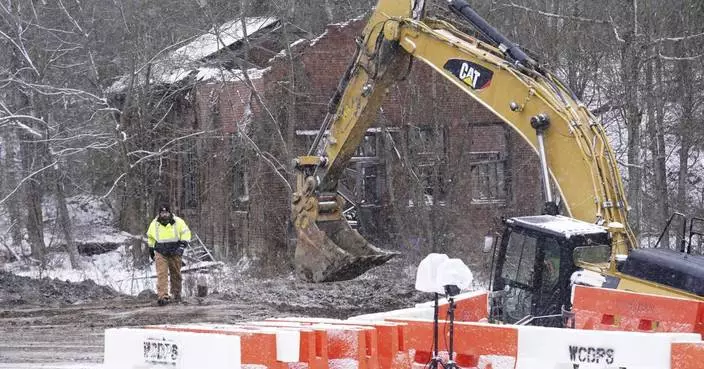 Crews recover the body of a woman from a Pennsylvania sinkhole