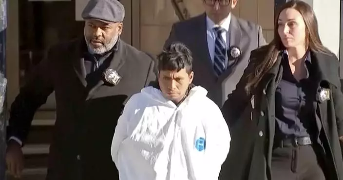 Man accused in the burning death of a woman on a New York subway awaits arraignment