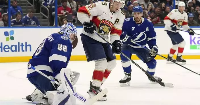 Panthers Tkachuk helped off the ice after collision with Tampa Bay&#8217;s Kucherov; returns to game