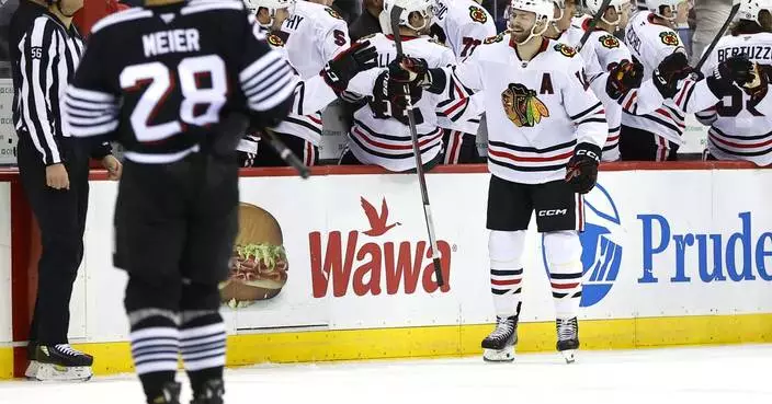 Jack Hughes helps the Devils rally for a 4-1 victory over the Blackhawks