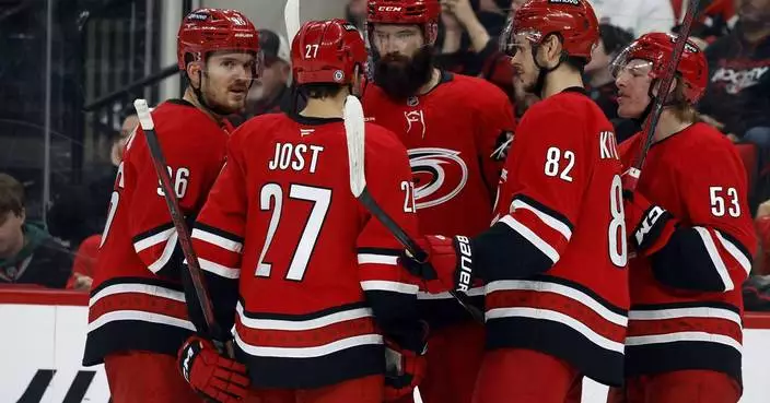 Roslovic scores twice in Hurricanes' four-goal third in 5-2 win over Devils