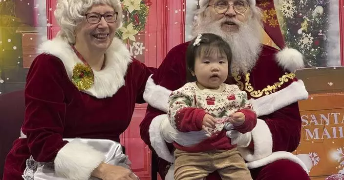 Santa and Mrs. Claus use military transports to bring Christmas to an Alaska Native village