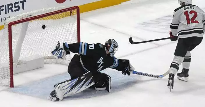 Matt Boldy scores the only goal in a shootout to send the Wild past Utah 5-4