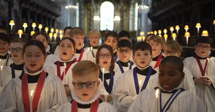 AP PHOTOS: Girls will be part of St. Paul's Cathedral choir on Christmas Day for first time