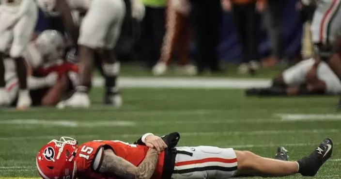 Georgia QB Carson Beck returns from hand injury for final snap in SEC championship OT win over Texas