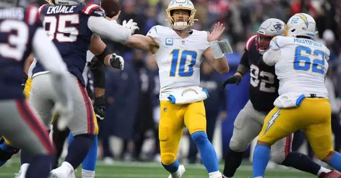 Justin Herbert tosses 3 TDs, Chargers clinch a playoff spot with a 40-7 rout of Patriots