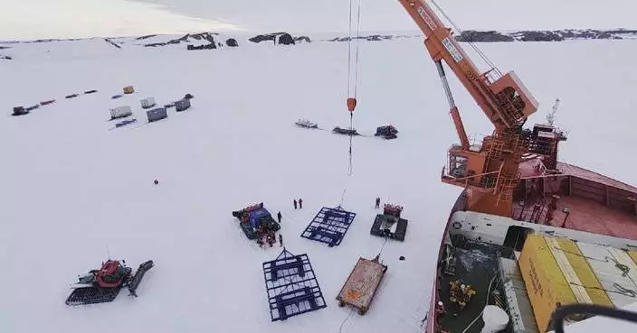 Chinese icebreakers unload supplies for research base in Antarctica