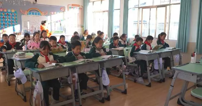 Yunnan school provides family-like care for left-behind children