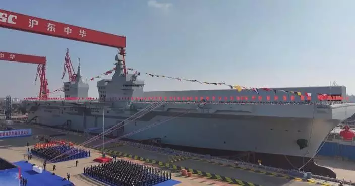 China launches new-generation amphibious assault ship