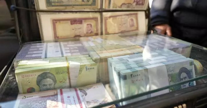 Iran&#8217;s rial hits a record low, battered by regional tensions and an energy crisis