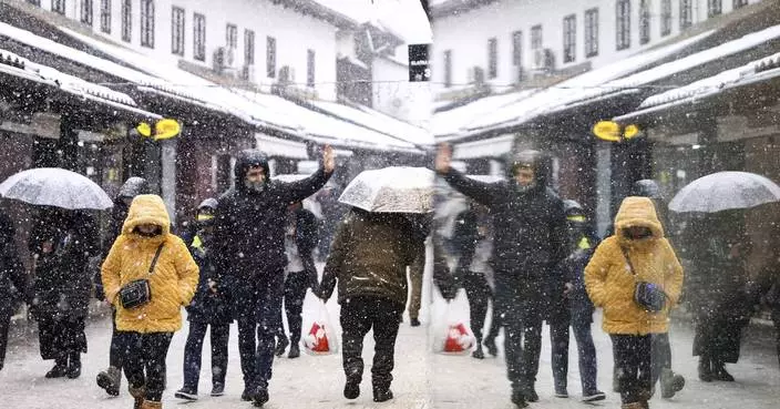 Rescue of hikers in Slovenia resumes as snow brings traffic chaos and power outages across Balkans