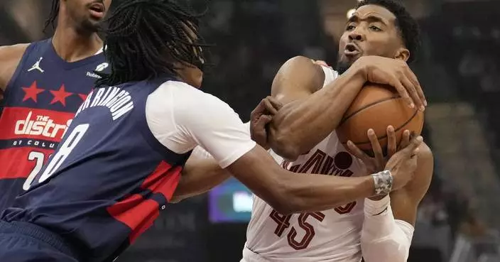 Darius Garland scores 24 points for NBA-leading Cavaliers in 115-105 victory over Wizards