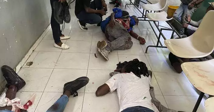 Haiti gang attack on journalists covering a hospital reopening leaves 2 dead, several wounded