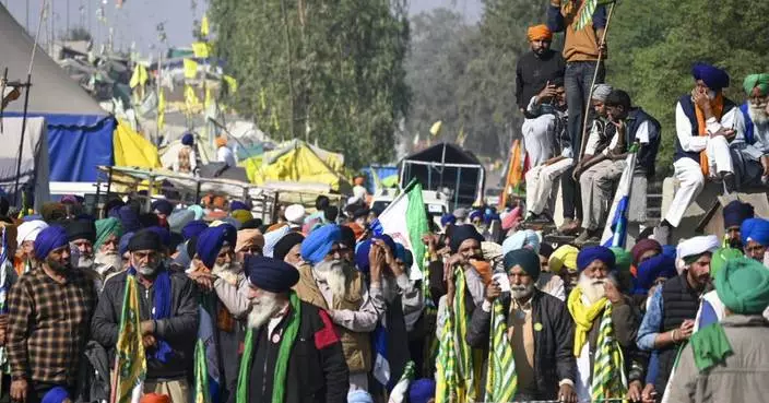 Police in India clash with farmers during protest march over minimum price demand for crops