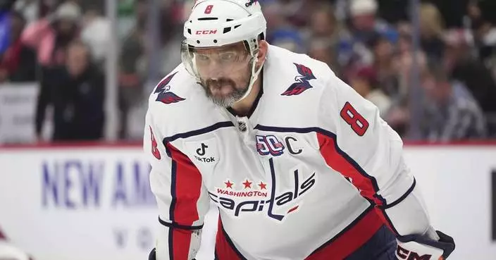 Alex Ovechkin skates before Capitals practice as he works to return from a broken leg