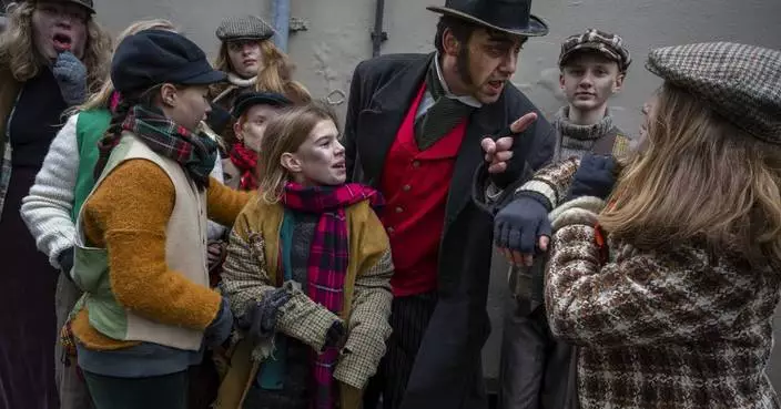 Charles Dickens' characters come alive in a Dutch town enamored with the English author