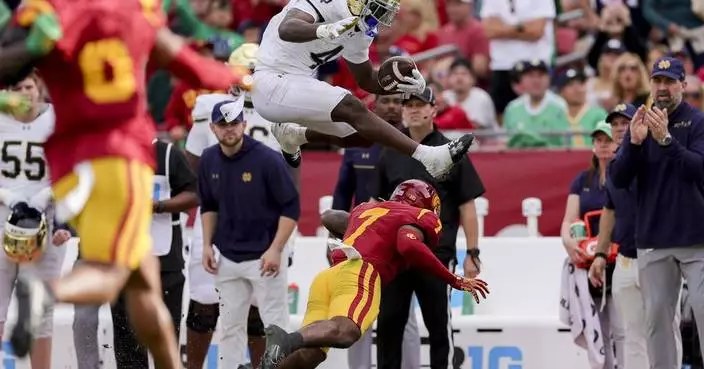 No. 5 Notre Dame punches CFP ticket with 2 late interception return TDs to beat USC 49-35