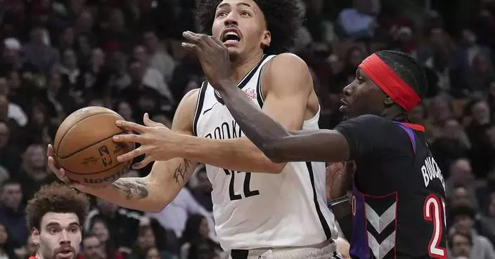 Johnson hits tiebreaking 3, scores 15 of his 33 points in the 4th as Nets rally to beat Raptors