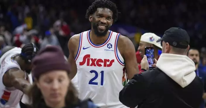 76ers star Joel Embiid falls during warmups but remains in lineup for matchup with Celtics