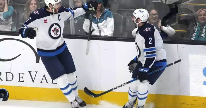 Lowry scores late goal to help Winnipeg Jets top San Jose Sharks 4-3