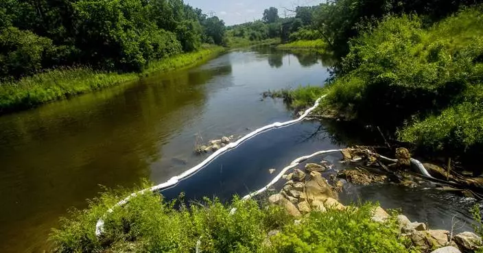 Company official charged in 2022 oil-chemical discharge into Michigan's Flint River