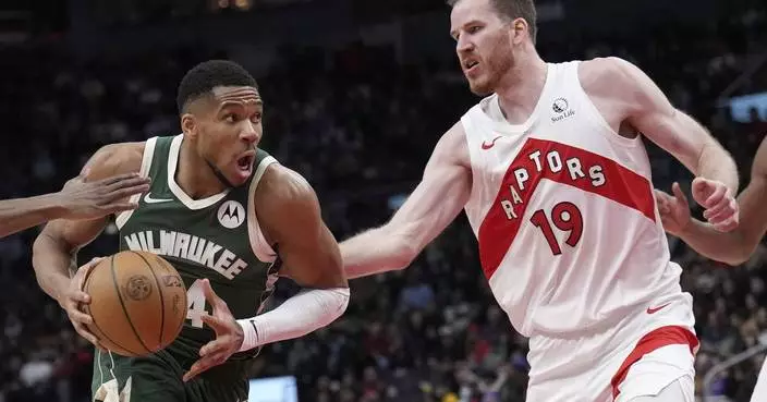 Antetokounmpo needs 3 stitches in finger and returns to post a triple-double in win over Raptors